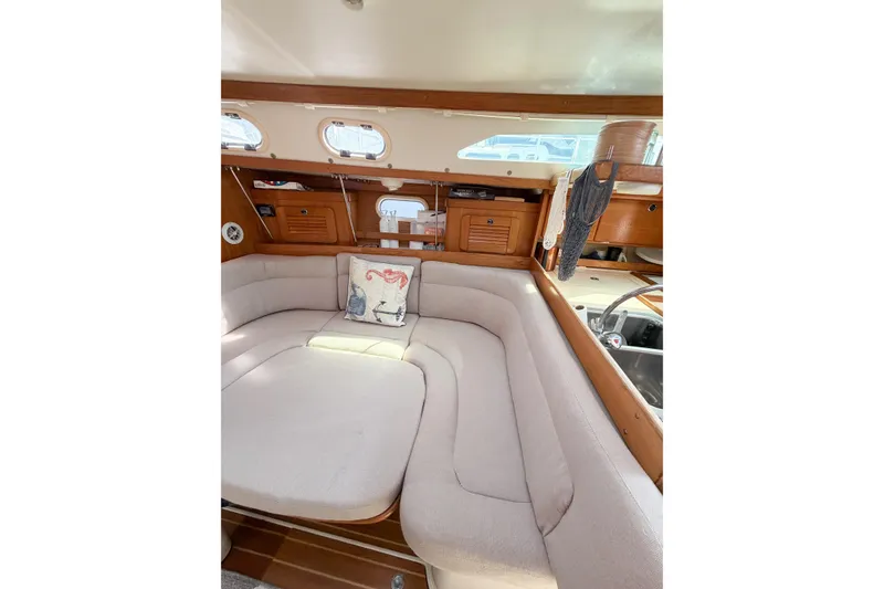 Slide: The Image of Interior of 2003 Catalina 34 MkII sailboat with cozy seating and nautical decor. - 39