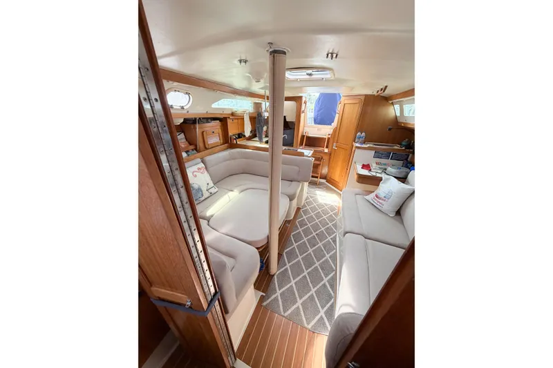 Slide: The Image of Interior of 2003 Catalina 34 MkII sailboat with cozy seating and wooden finishes. - 45