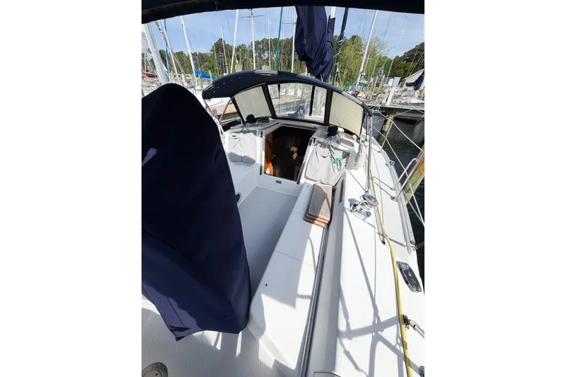 Slide: The Image of Cockpit view of a 2003 Catalina 34 MkII sailboat docked at a marina. - 7