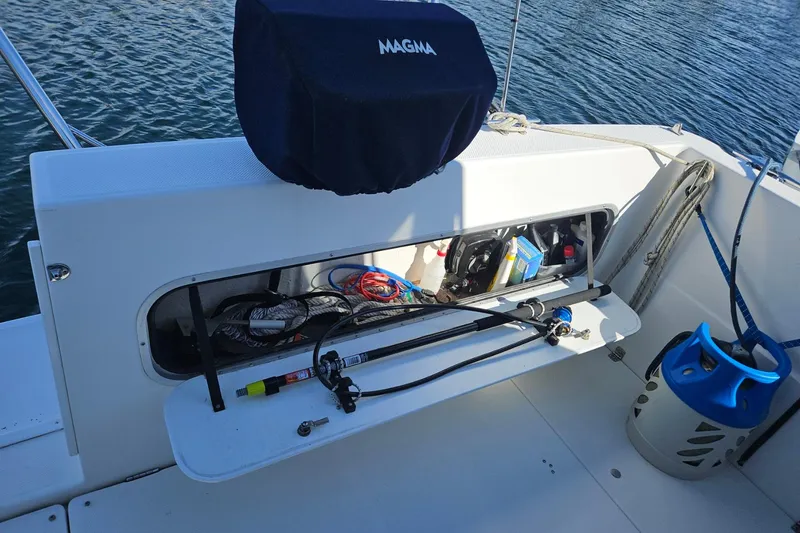 Slide: The Image of 2002 Bayliner 2859 Ciera Classic boat storage with fishing gear and equipment. - 12