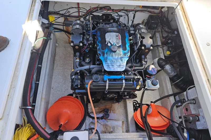 Slide: The Image of Engine compartment of a 2002 Bayliner 2859 Ciera Classic boat, showcasing detailed mechanics. - 18