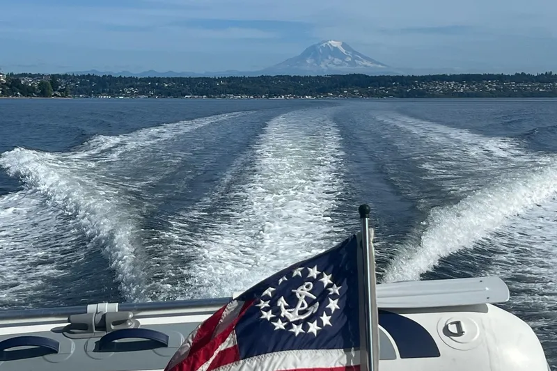 Slide: The Image of Bayliner 2859 Ciera Classic cruising with mountain view, 2002 model. - 21