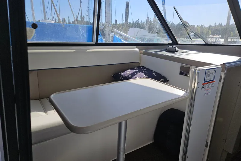 Slide: The Image of Interior of 2002 Bayliner 2859 Ciera Classic boat with seating and table. - 7