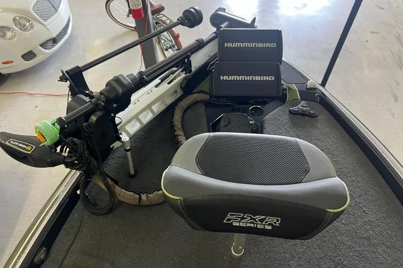 Slide: The Image of 2024 Skeeter FXR21 Apex boat with advanced trolling motor on deck. - 13