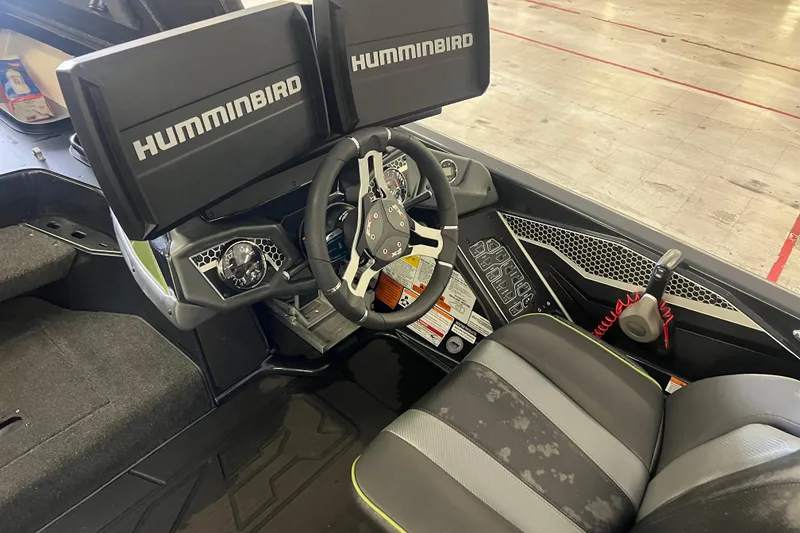 Slide: The Image of Foot pedal controls on 2024 Skeeter FXR21 Apex boat, featuring advanced navigation technology. - 14