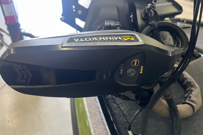 Slide: The Image of 2024 Skeeter FXR21 Apex boat dashboard with dual screens and trolling motor. - 16