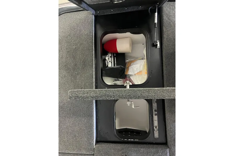 Slide: The Image of 2024 Skeeter FXR21 Apex boat interior with dual seats and advanced dashboard. - 22