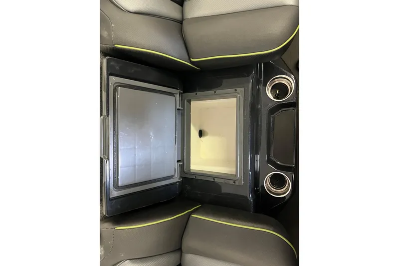Slide: The Image of 2024 Skeeter FXR21 Apex boat interior with open storage compartments. - 24