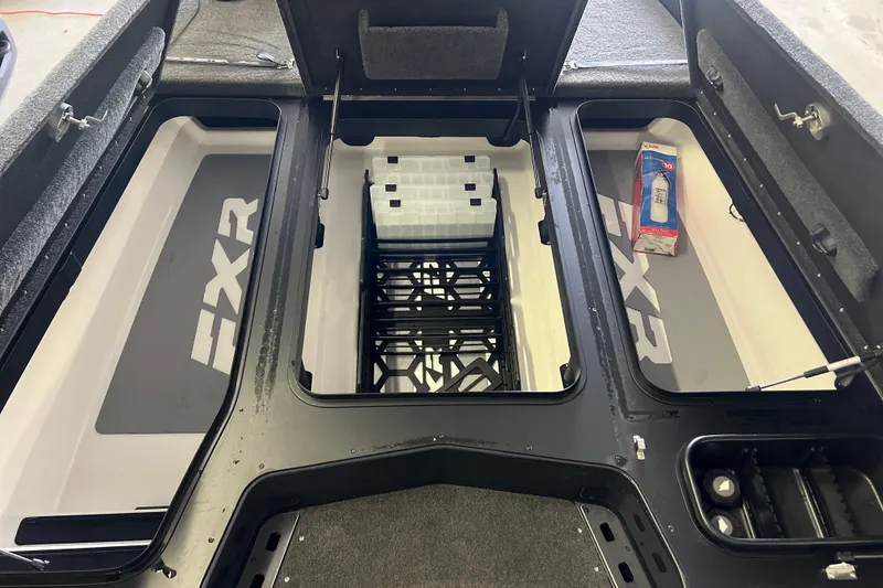 Slide: The Image of 2024 Skeeter FXR21 Apex livewell interior with drainage and aeration system. - 26