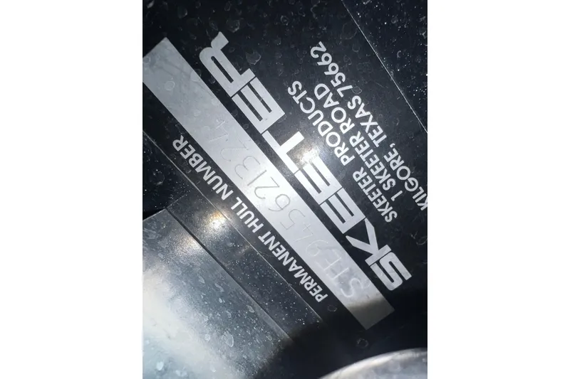 Slide: The Image of 2024 Skeeter FXR21 Apex boat with Minn Kota trolling motors, top view. - 27