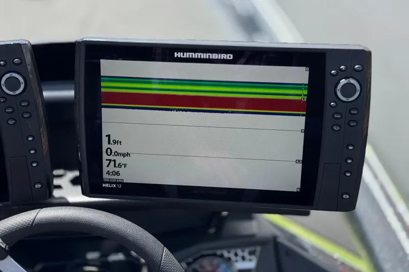 Slide: The Image of 2024 Skeeter FXR21 Apex boat with Humminbird Helix 12 fishfinder display. - 32