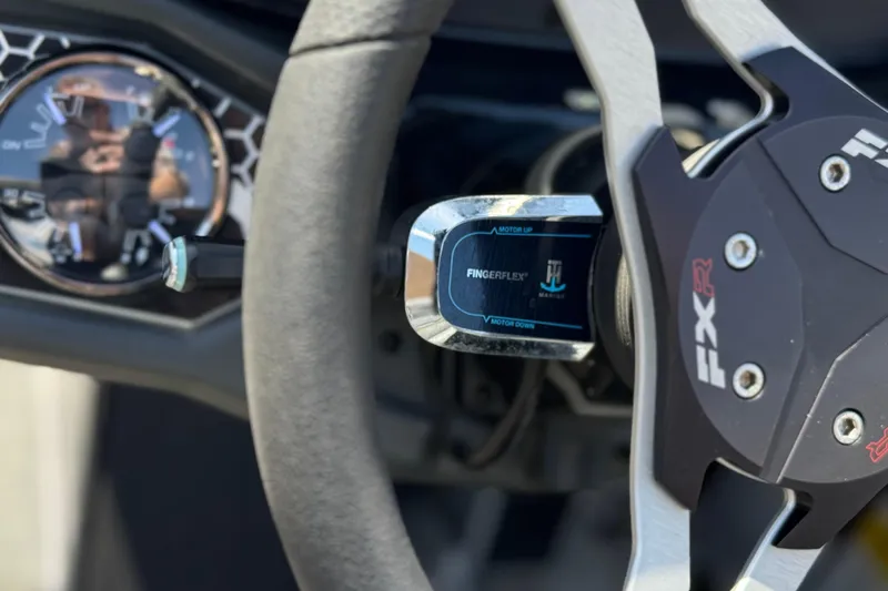Slide: The Image of 2024 Skeeter FXR21 Apex steering wheel with FingerFlex control detail. - 34