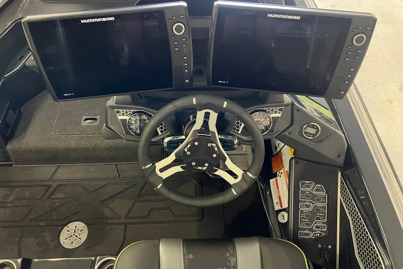 Slide: The Image of 2024 Skeeter FXR21 Apex boat with Yamaha engine, parked outdoors. - 8