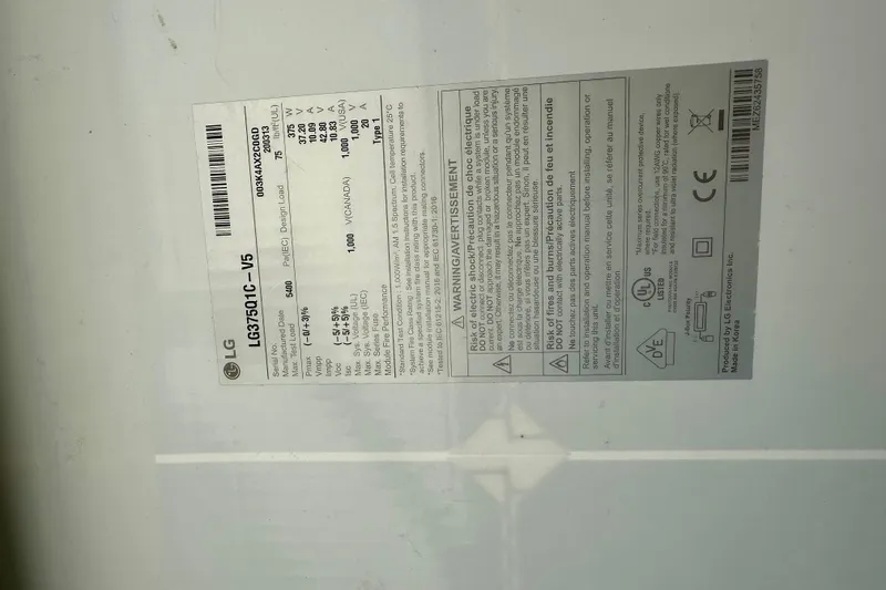 Slide: The Image of Label on LG appliance with specifications and safety warnings. - 100