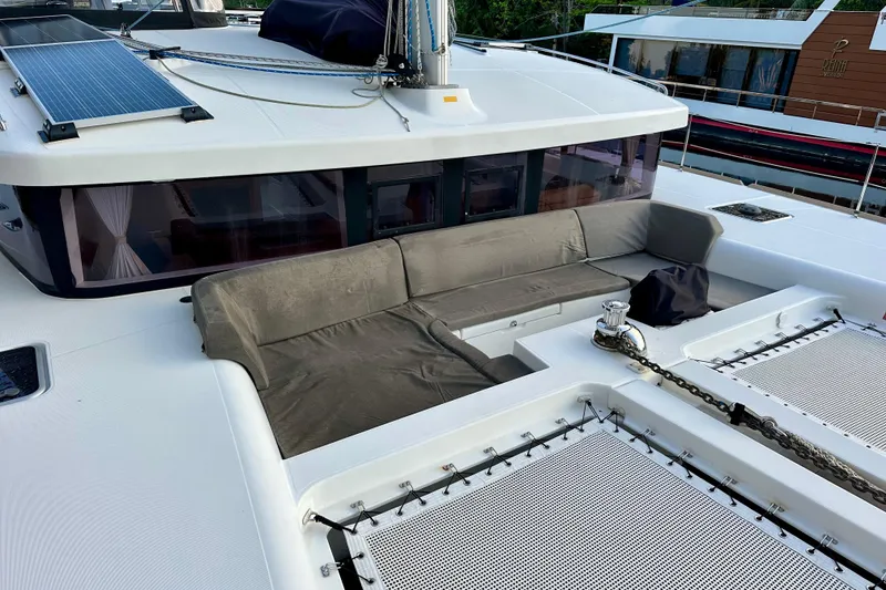 Slide: The Image of 2016 Lagoon 450 S catamaran deck with seating and solar panels. - 31