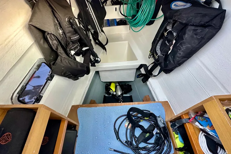 Slide: The Image of Interior of 2016 Lagoon 450 S yacht with diving gear and equipment storage. - 36