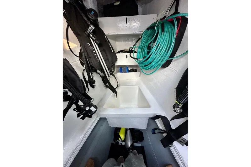 Slide: The Image of Interior of 2016 Lagoon 450 S yacht with diving equipment and storage area. - 37