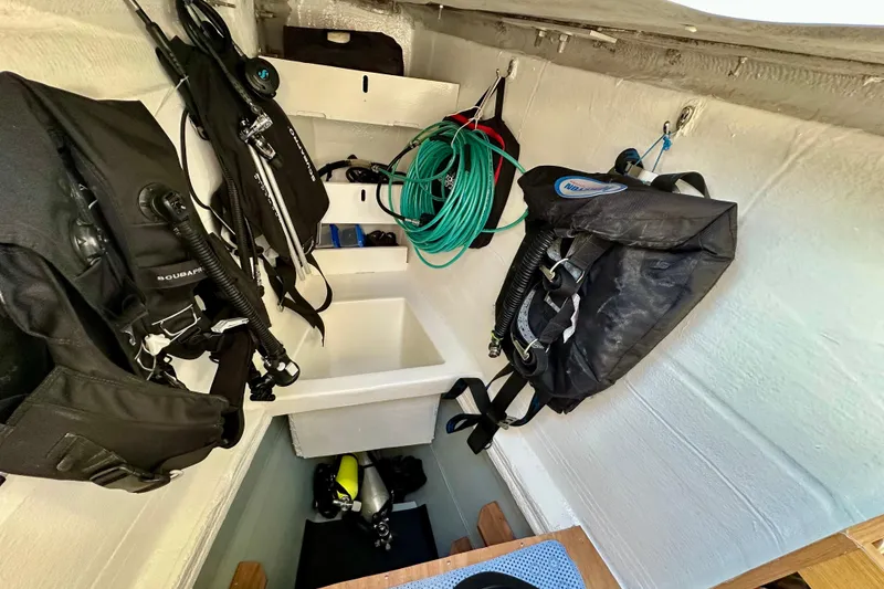 Slide: The Image of Storage area with scuba gear on a 2016 Lagoon 450 S yacht. - 38