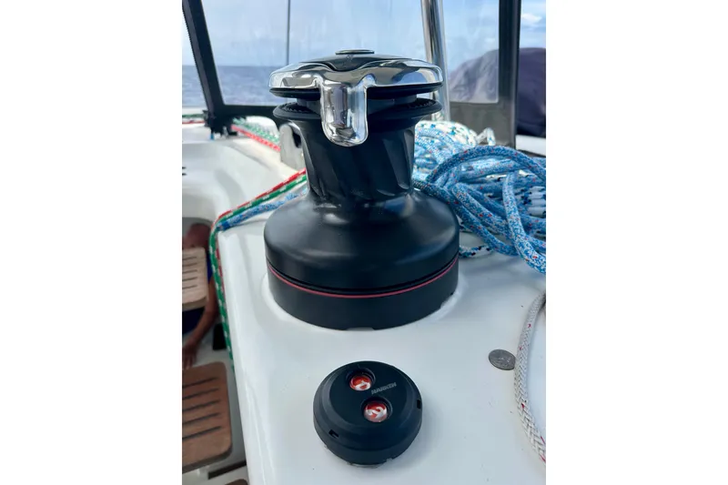 Slide: The Image of Winch and ropes on 2016 Lagoon 450 S catamaran deck, showcasing sailing equipment. - 47