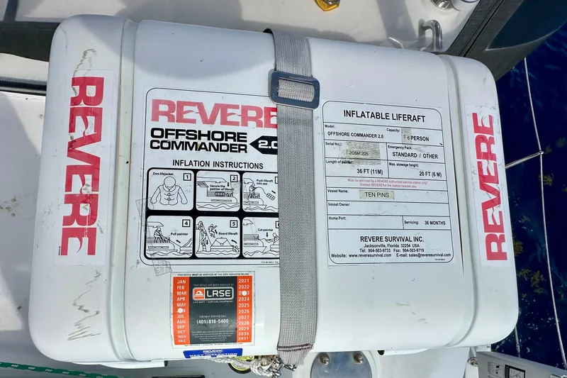Slide: The Image of Inflatable liferaft on Lagoon 450 S, 2016 model, with Revere Offshore Commander 2.0 branding. - 54