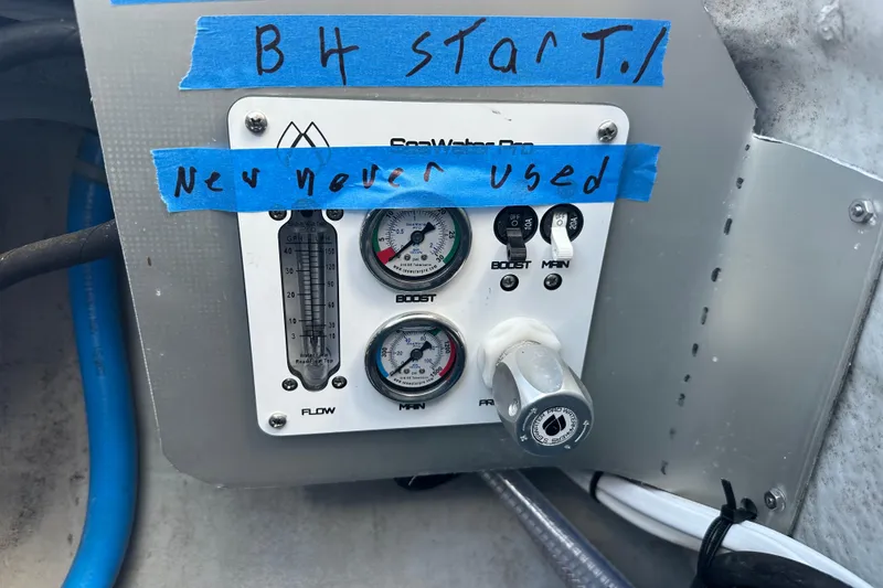 Slide: The Image of Control panel of a 2016 Lagoon 450 S with handwritten labels and gauges. - 58