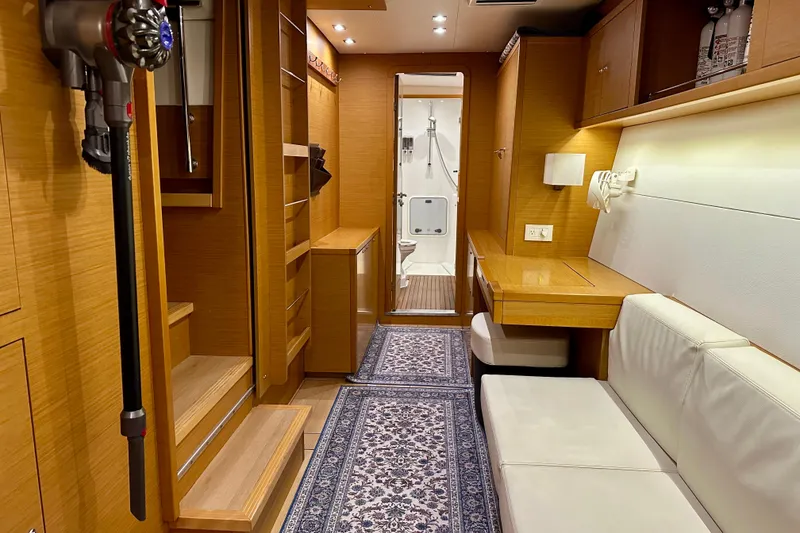 Slide: The Image of Interior of 2016 Lagoon 450 S yacht with modern wood finish and cozy seating area. - 62