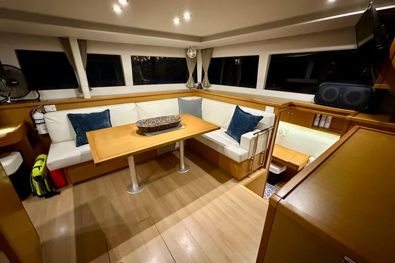 Slide: The Image of Interior of 2016 Lagoon 450 S yacht with cozy seating and dining area. - 69