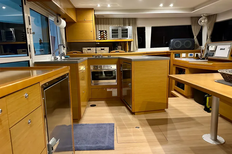 Slide: The Image of Luxurious interior of 2016 Lagoon 450 S yacht with modern kitchen and navigation equipment. - 72