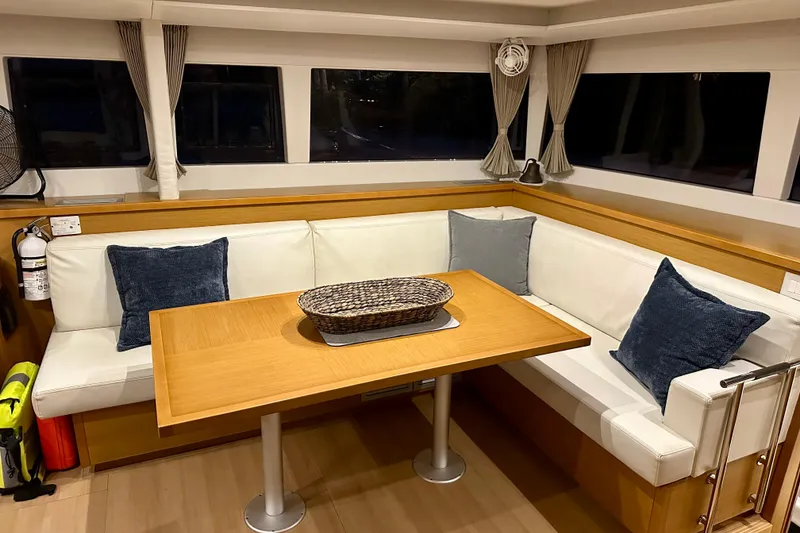 Slide: The Image of Luxurious interior of 2016 Lagoon 450 S yacht with cozy seating and elegant decor. - 73
