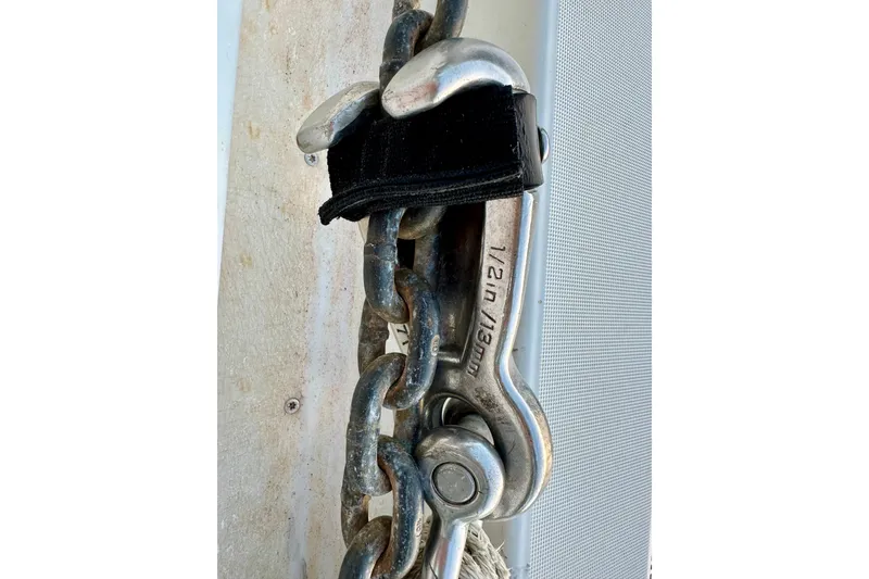 Slide: The Image of Heavy-duty chain and shackle on 2016 Lagoon 450 S yacht. - 91