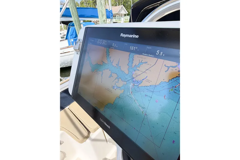 Slide: The Image of Raymarine navigation display on 2001 Caliber 40LRC sailboat, showing nautical chart details. - 25