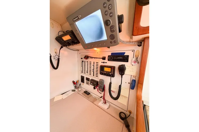 Slide: The Image of Navigation and communication equipment inside a 2001 Caliber 40LRC sailboat. - 36