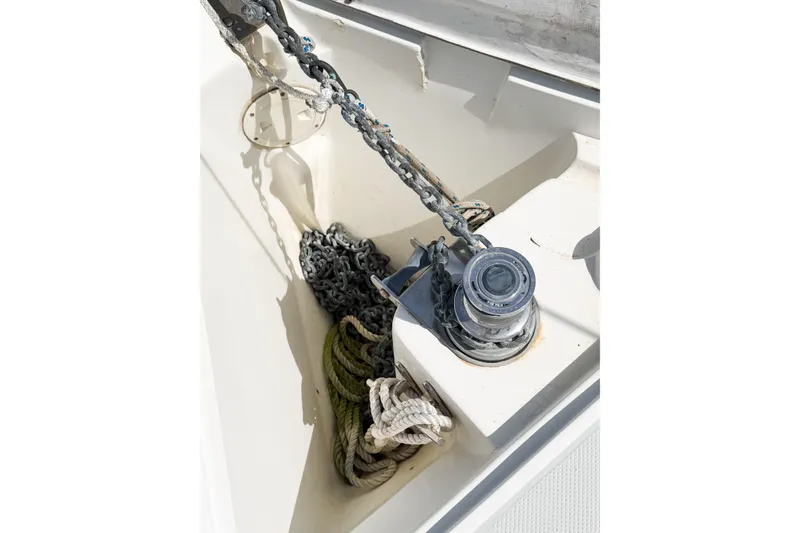 Slide: The Image of Anchor chain and ropes in a 2001 Caliber 40LRC sailboat's storage compartment. - 6
