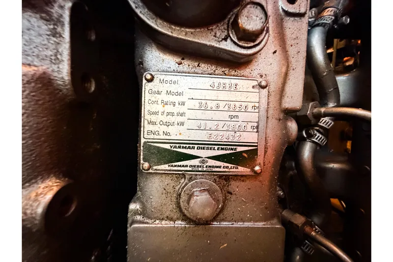 Slide: The Image of Close-up of a Yanmar diesel engine plate on a 2001 Caliber 40LRC. - 71