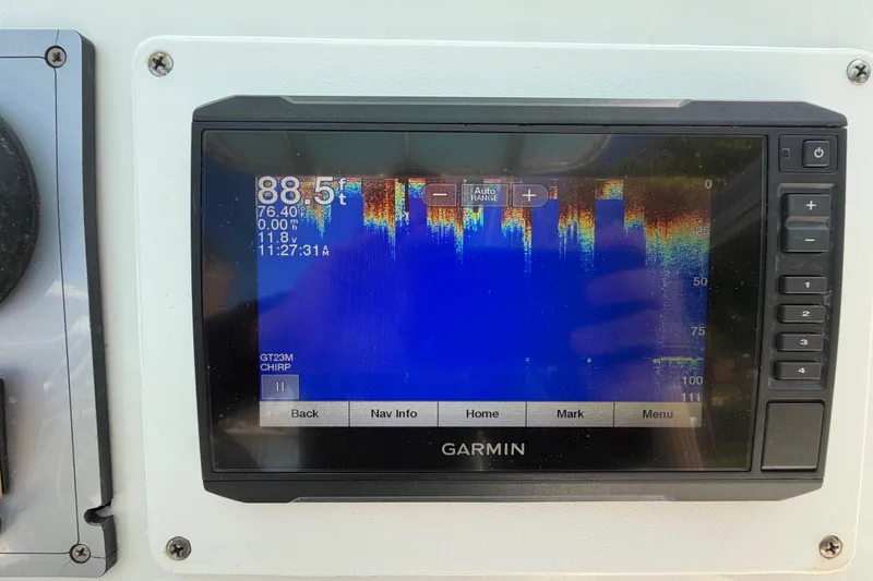 Slide: The Image of Garmin fishfinder display on a 2017 Release 196 RX boat, showing sonar data. - 26