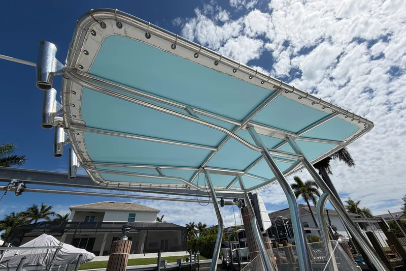 Slide: The Image of Boat canopy with metal frame under a partly cloudy sky, Release 196 RX, 2017 model. - 34