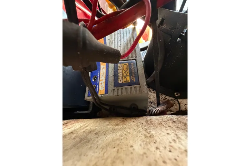 Slide: The Image of Close-up of a Charge Pro Series device with red and black cables, 2017 Release 196 RX. - 37