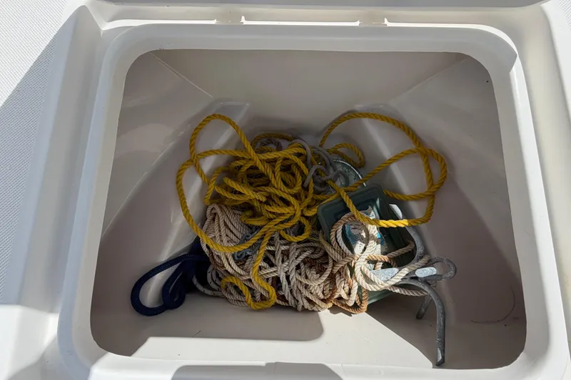 Slide: The Image of Boat storage compartment with ropes and anchor, Release 196 RX, 2017 model. - 42