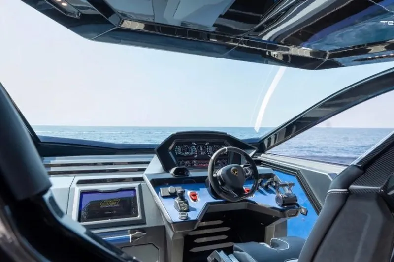 Slide: The Image of Cockpit of 2026 Tecnomar LY63 yacht with modern controls and ocean view. - 3