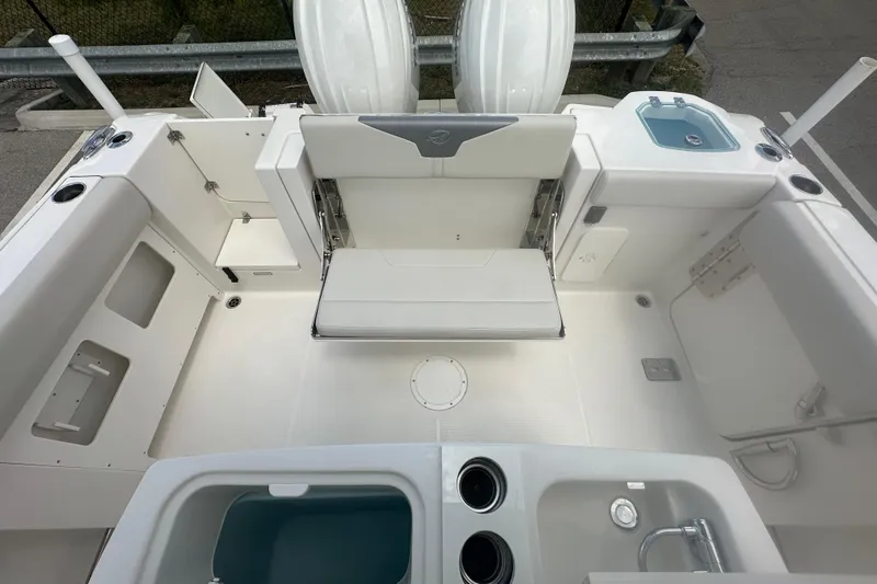 Slide: The Image of 2026 Sailfish 272 CC boat interior with seating, storage, and sink. - 14