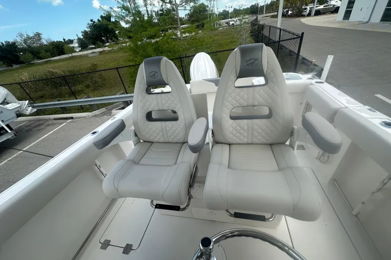 Slide: The Image of Luxury seating on 2026 Sailfish 272 CC boat, featuring plush, ergonomic design. - 15