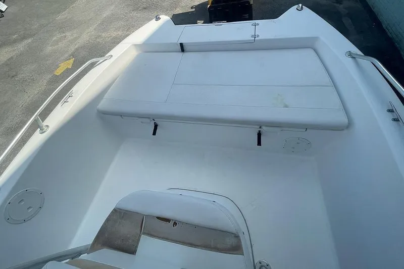 Slide: The Image of 2007 ProKat CS200 boat interior with seating and storage compartments. - 7