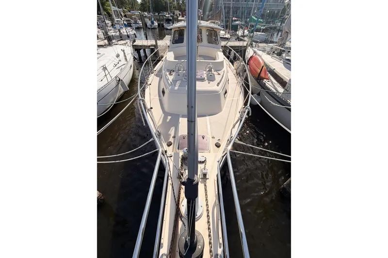 Slide: The Image of 2007 Island Packet SP Cruiser sailboat docked at marina, top view. - 10