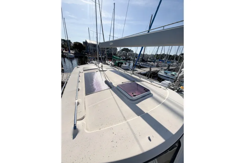 Slide: The Image of 2007 Island Packet SP Cruiser sailboat deck view at marina. - 20