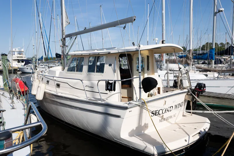 Slide: The Image of 2007 Island Packet SP Cruiser docked at marina, named "Second Wind," New Bern, NC. - 3