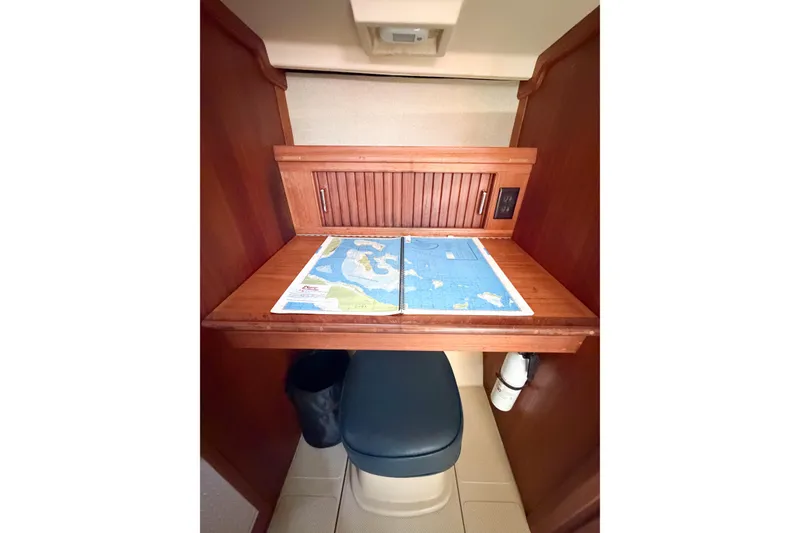 Slide: The Image of Navigation station with map in 2007 Island Packet SP Cruiser yacht interior. - 47