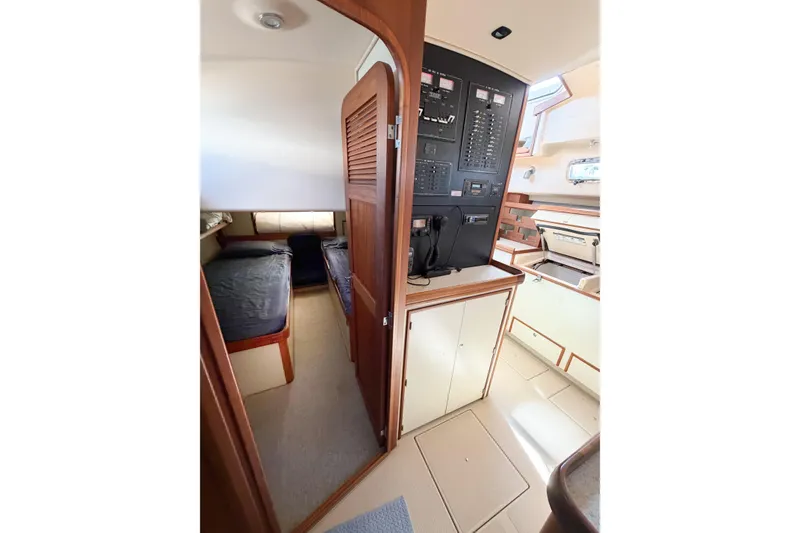 Slide: The Image of 2007 Island Packet SP Cruiser interior with cozy cabin and navigation panel. - 52