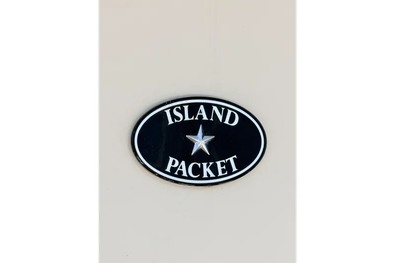 Slide: The Image of Island Packet SP Cruiser 2007 logo with star emblem on beige background. - 87