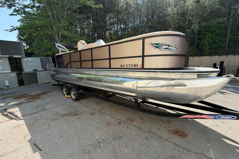 The Image of 2019 Bentley Pontoons 250/253 Elite Admiral on trailer, parked outdoors. - 0