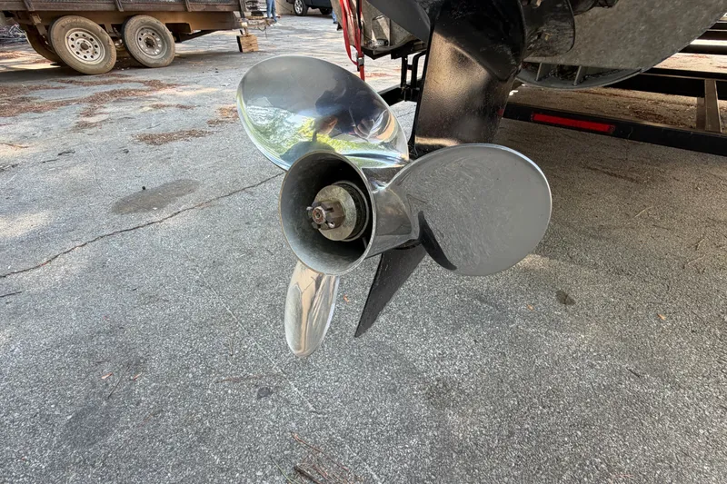 Slide: The Image of 2019 Bentley Pontoons 250/253 Elite Admiral propeller on a trailer. - 13